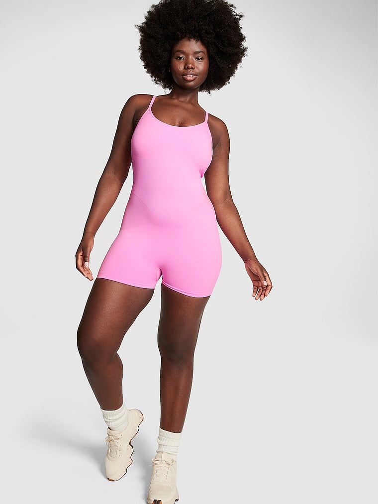 PINK The Wave Soft Seamless Onesie, Lola Pink, onModelFront, 1 of 3 Fanta is 5'11" and wears Medium
