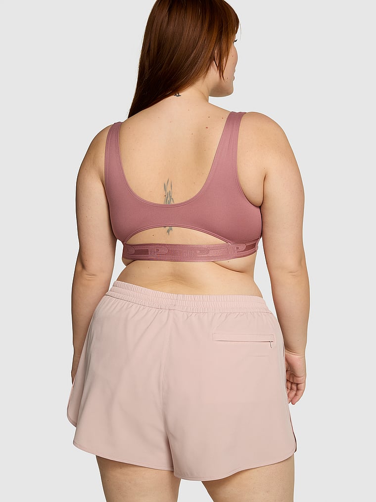 PINK Tech Stretch Running Shorts, Wanna Be Pink, onModelBack, 4 of 4 Lulu is 5'7" and wears Large