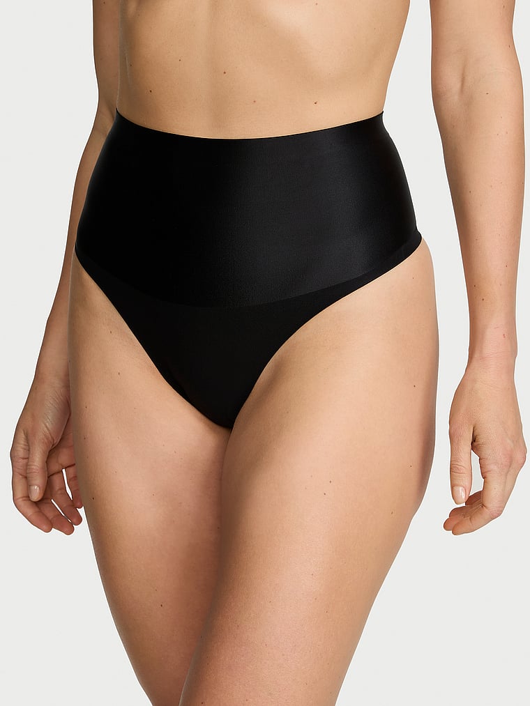 Victoria's Secret, Body by Victoria Smoothing Shimmer Thong Panty, Black, onModelFront, 1 of 3 Katherine is 5'10" and wears Large