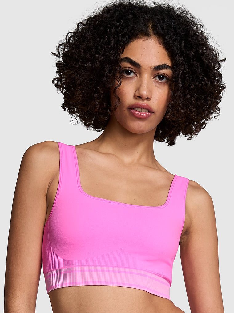 PINK PINK Flip It Seamless Reversible Sports Bra, Pink, onModelFront, 1 of 4 Vanessa is 5'10" and wears 32B or Small