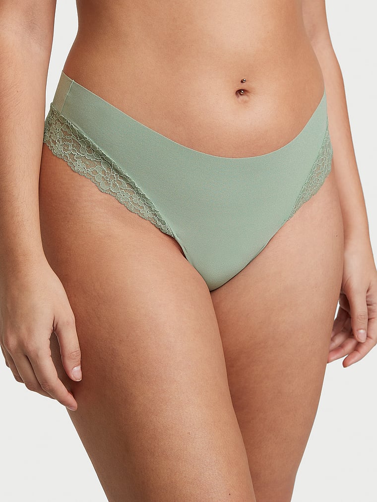 Victoria's Secret, No-Show No-Show Lace-Trim Thong Panty, Green, onModelFront, 1 of 3 Lorena is 5'9" and wears Large