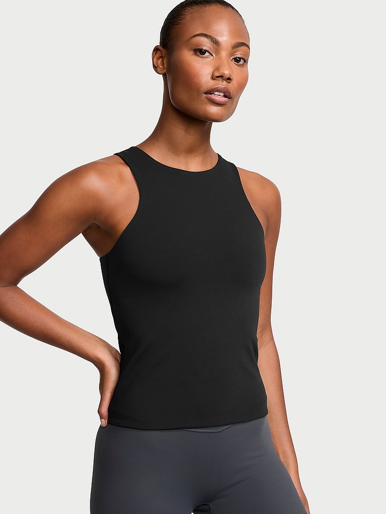 Victoria's Secret, Victoria's Secret VS Elevate Cut-Out Tank Top, Black, onModelFront, 1 of 4 Ange-Marie is 5'10" and wears Small