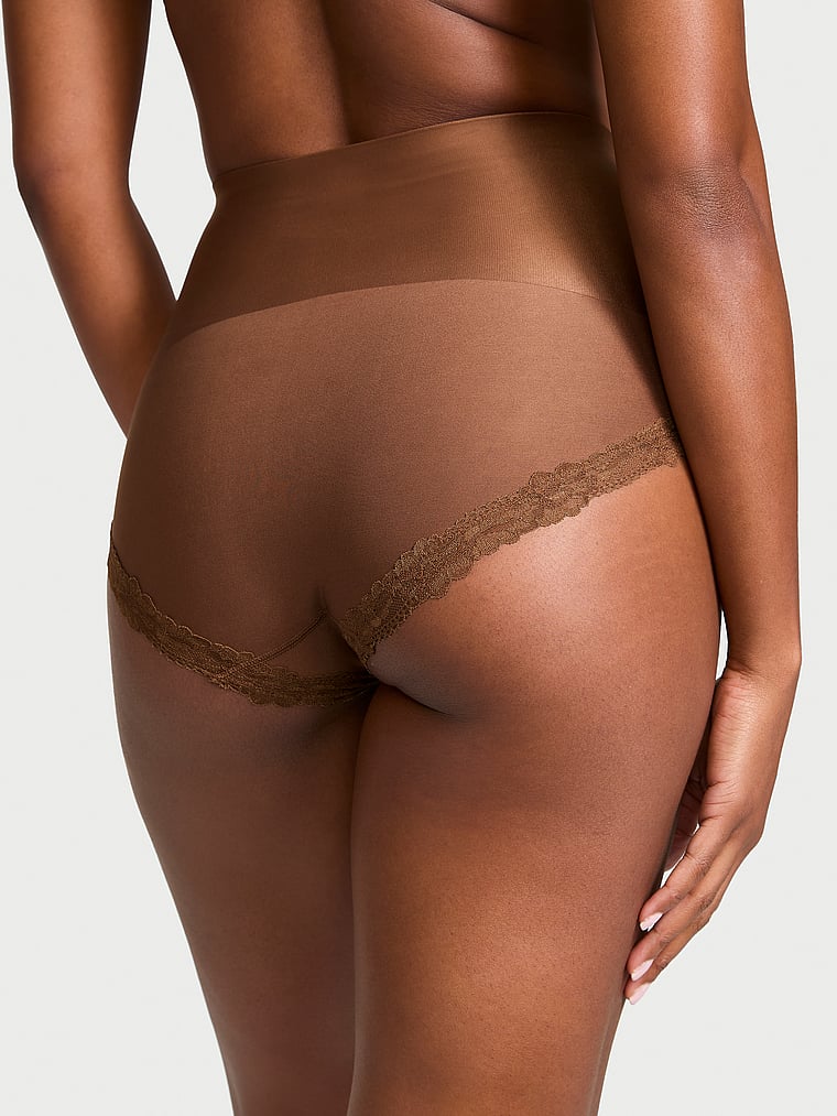Victoria's Secret, Body by Victoria Smoothing Shimmer Lace-Trim Brief Panty, Mousse, onModelBack, 2 of 3 Tsheca  is 5'9" and wears Small