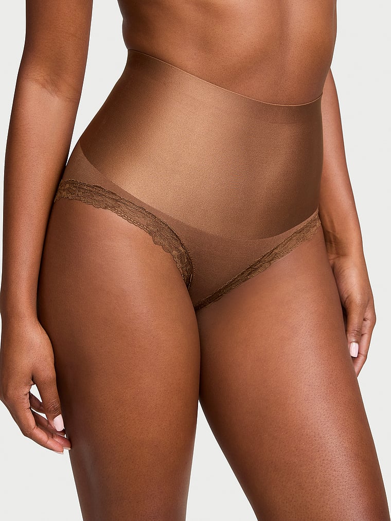 Victoria's Secret, Body by Victoria Smoothing Shimmer Lace-Trim Brief Panty, Mousse, onModelFront, 1 of 3 Tsheca  is 5'9" and wears Small