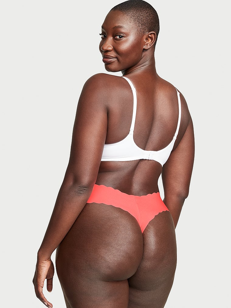 Victoria's Secret, No-Show No-Show Thong Panty, Coral Blaze, onModelBack, 2 of 3 Arame is 5'11" and wears Large