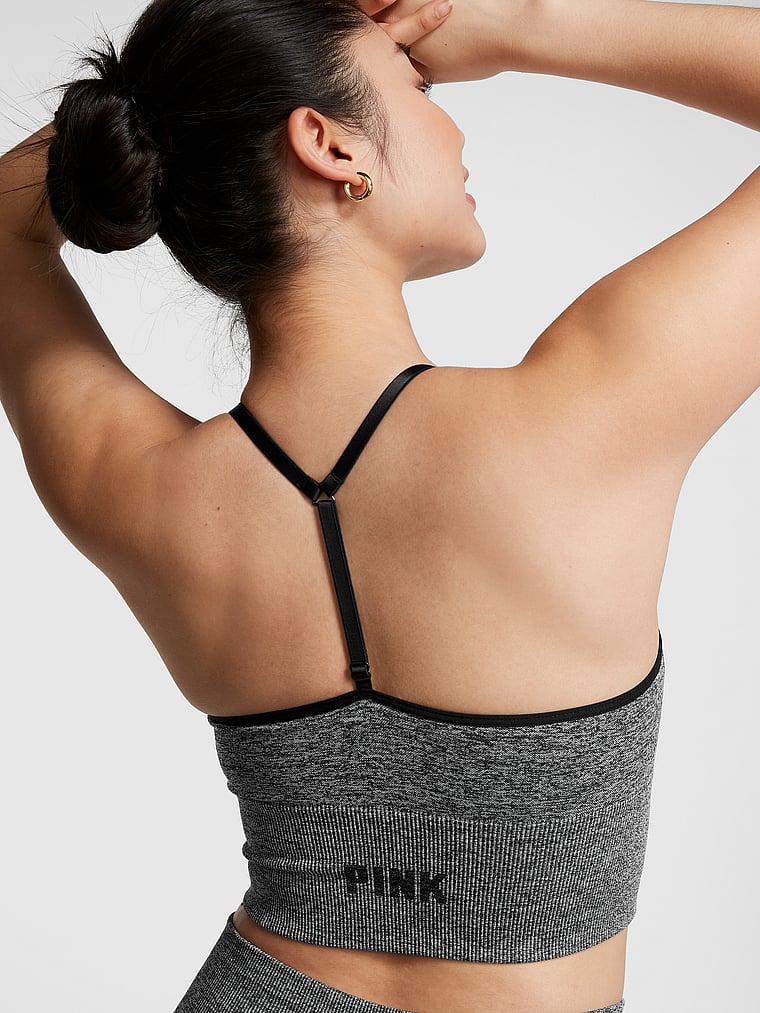 PINK Pink Active Seamless Air Low-Impact Sports Bra, Pure Black Marl, onModelBack, 2 of 4 Gloria is 5'9" and wears 34D or Small