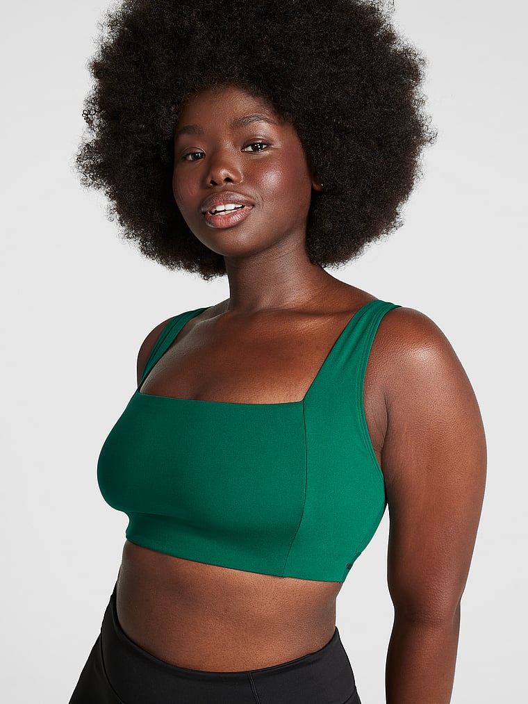 PINK Soft Ultimate Lightly Lined Square-Neck Sports Bra, Garnet Green, onModelFront, 1 of 4 Fanta is 5'11" and wears 34D or Medium