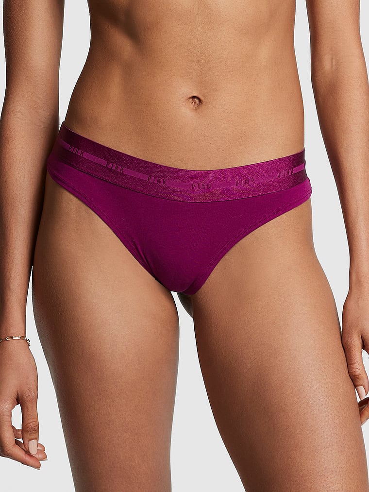 PINK Logo Thong Panty, Vivid Magenta, onModelFront, 1 of 3 Serguelen is 5'10" and wears Small